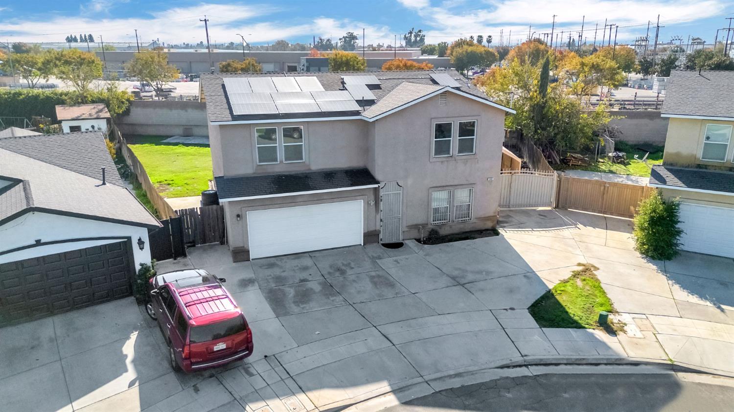 2061 Seventh Street Fresno, CA 93702 - Photo 3 of 38 a view of a back yard of the house