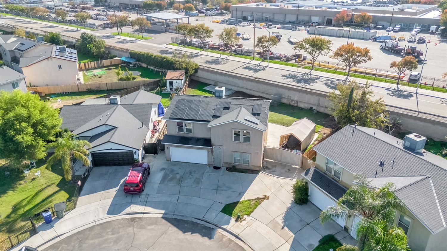 2061 Seventh Street Fresno, CA 93702 - Photo 4 of 38 an aerial view of a house with a garden