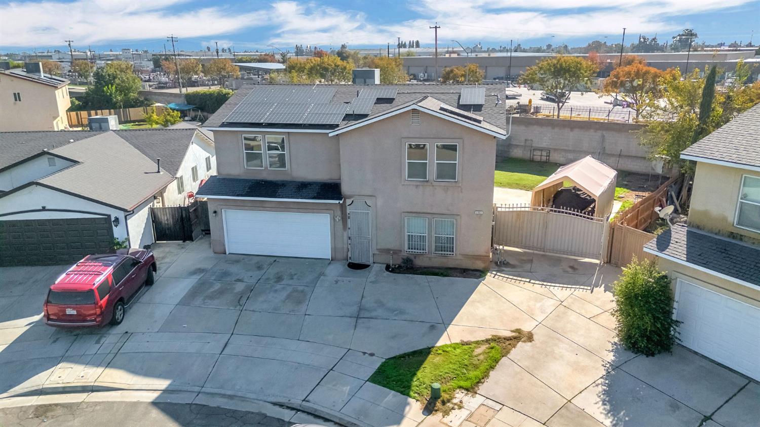 2061 Seventh Street Fresno, CA 93702 - Photo 5 of 38 an aerial view of a house with a yard