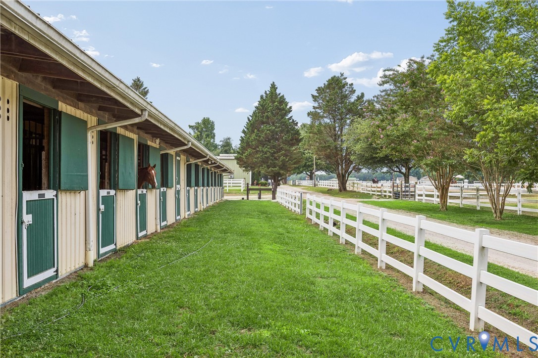 2016 Forge Road Toano, VA 23168 - Photo 21 of 99 Long barn structure featuring multiple stalls with