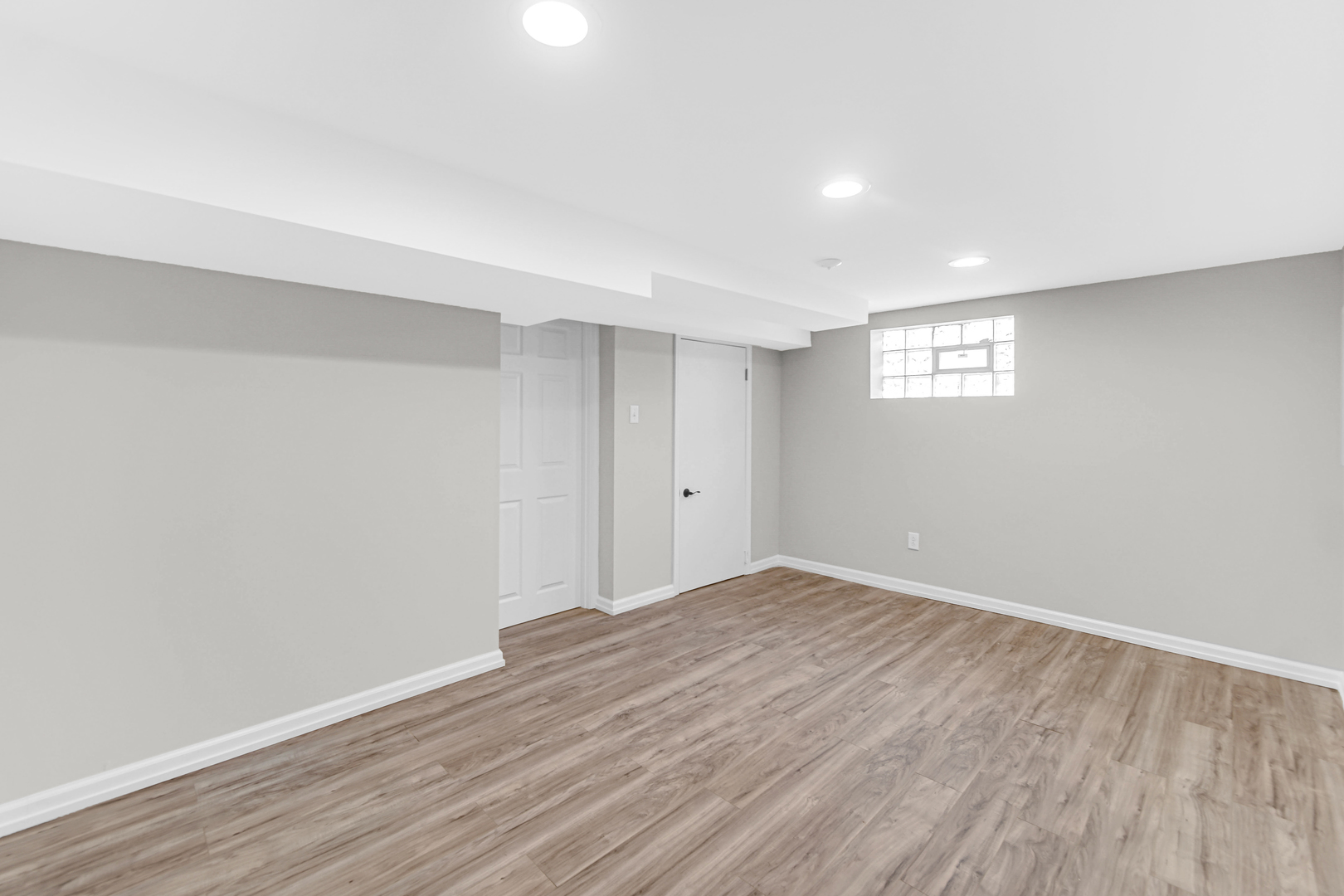 10328 South Union Avenue Chicago, IL 60628 - Photo 15 of 18 a view of an empty room with wooden floor