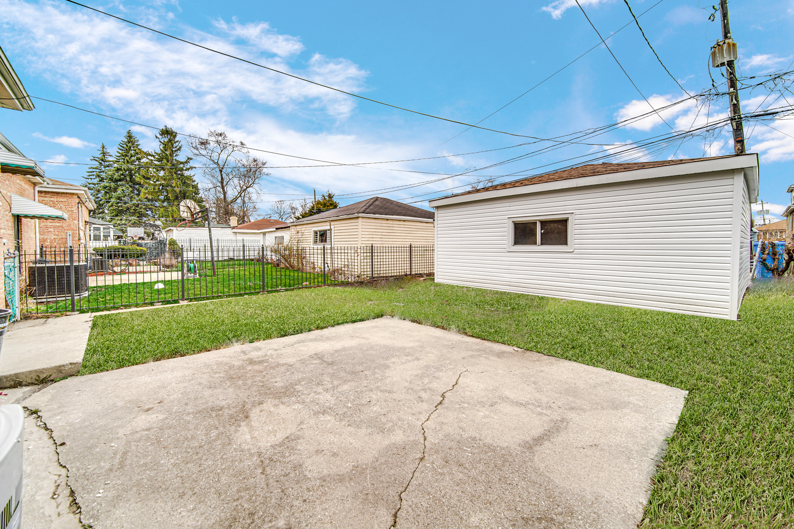 10328 South Union Avenue Chicago, IL 60628 - Photo 18 of 18 a view of a house with a yard