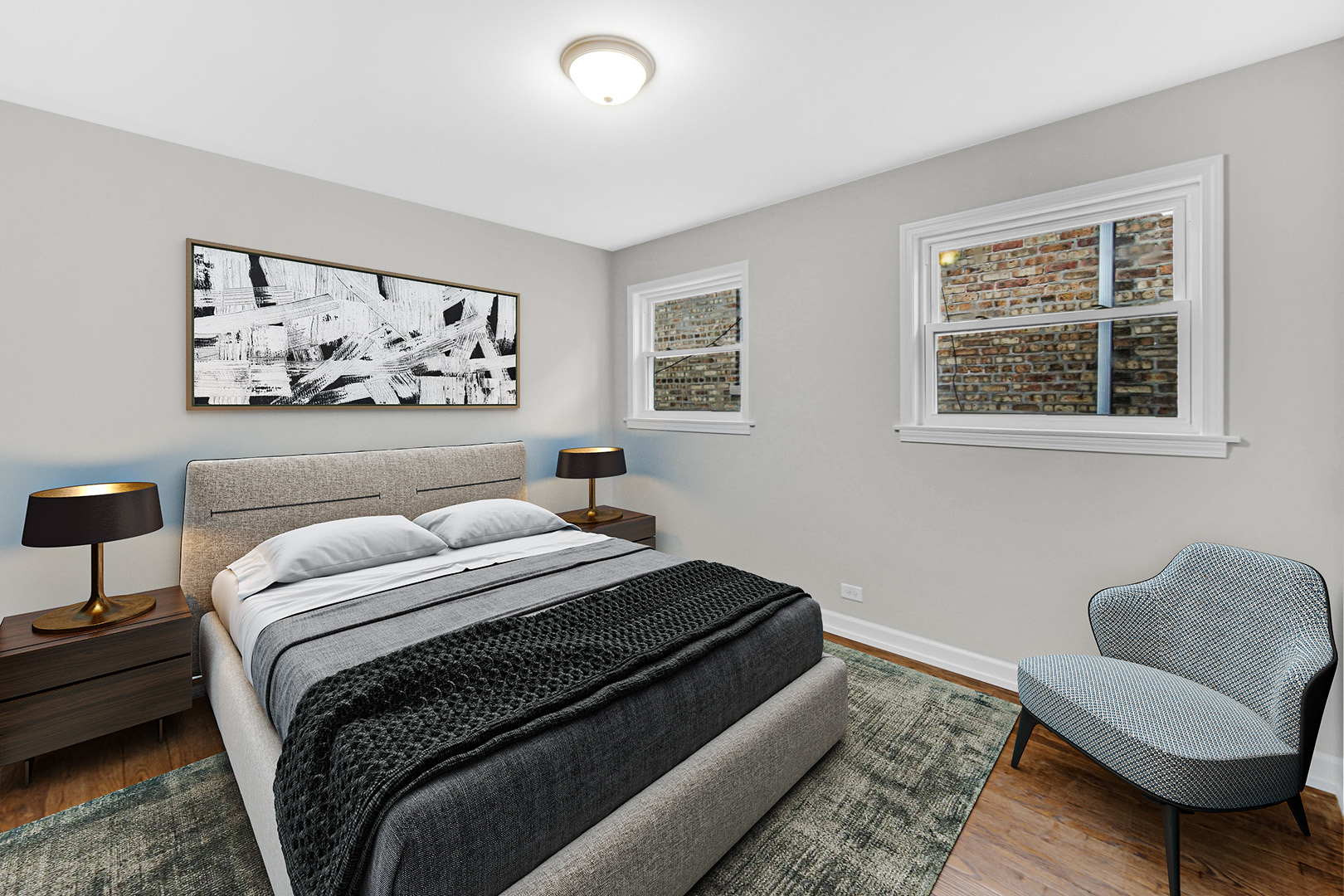 10328 South Union Avenue Chicago, IL 60628 - Photo 7 of 18 a bedroom with a bed and chair