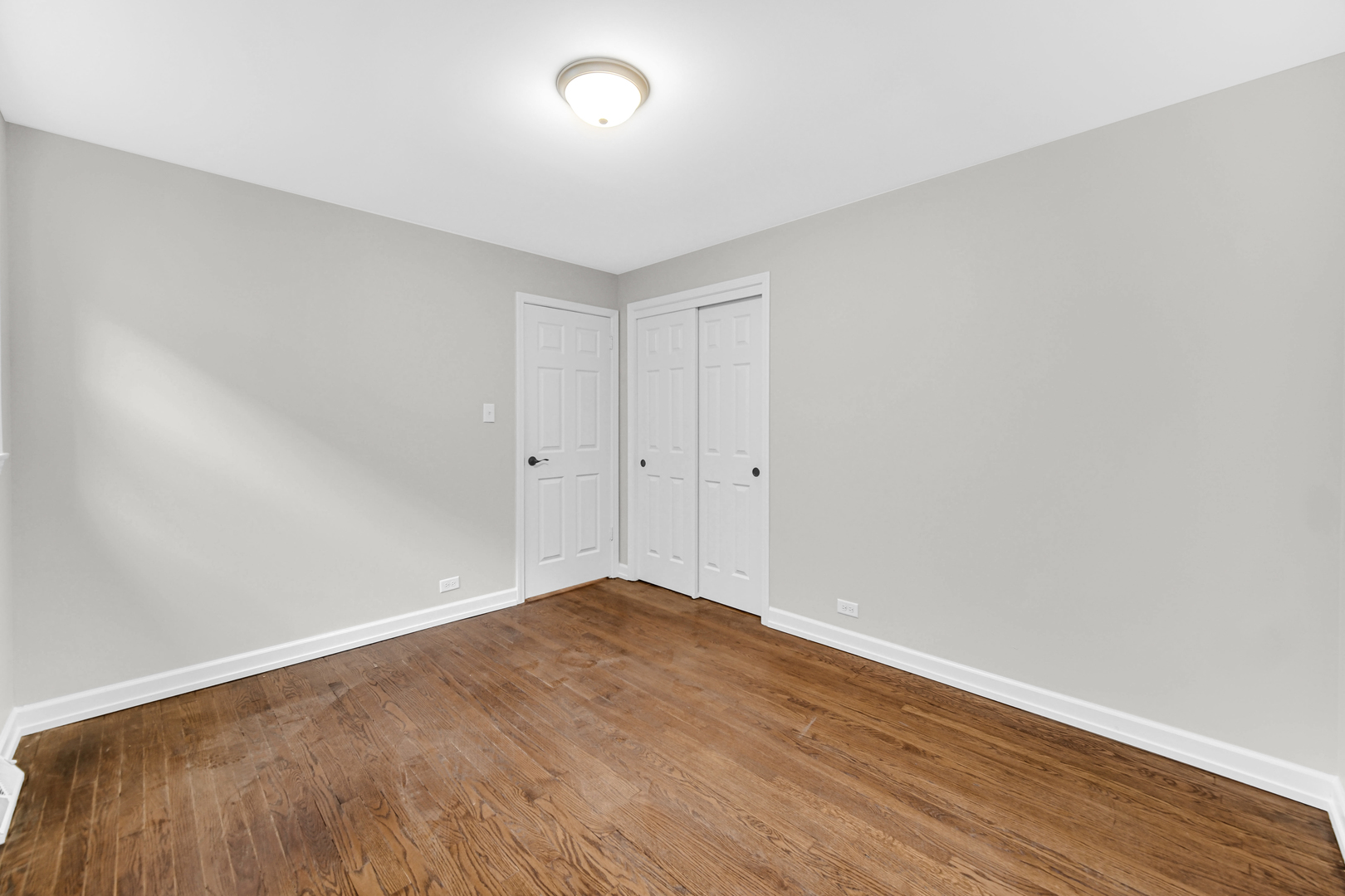 10328 South Union Avenue Chicago, IL 60628 - Photo 9 of 18 wooden floor in a room