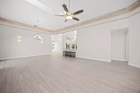 an aerial view of residential house with outdoor space and river view