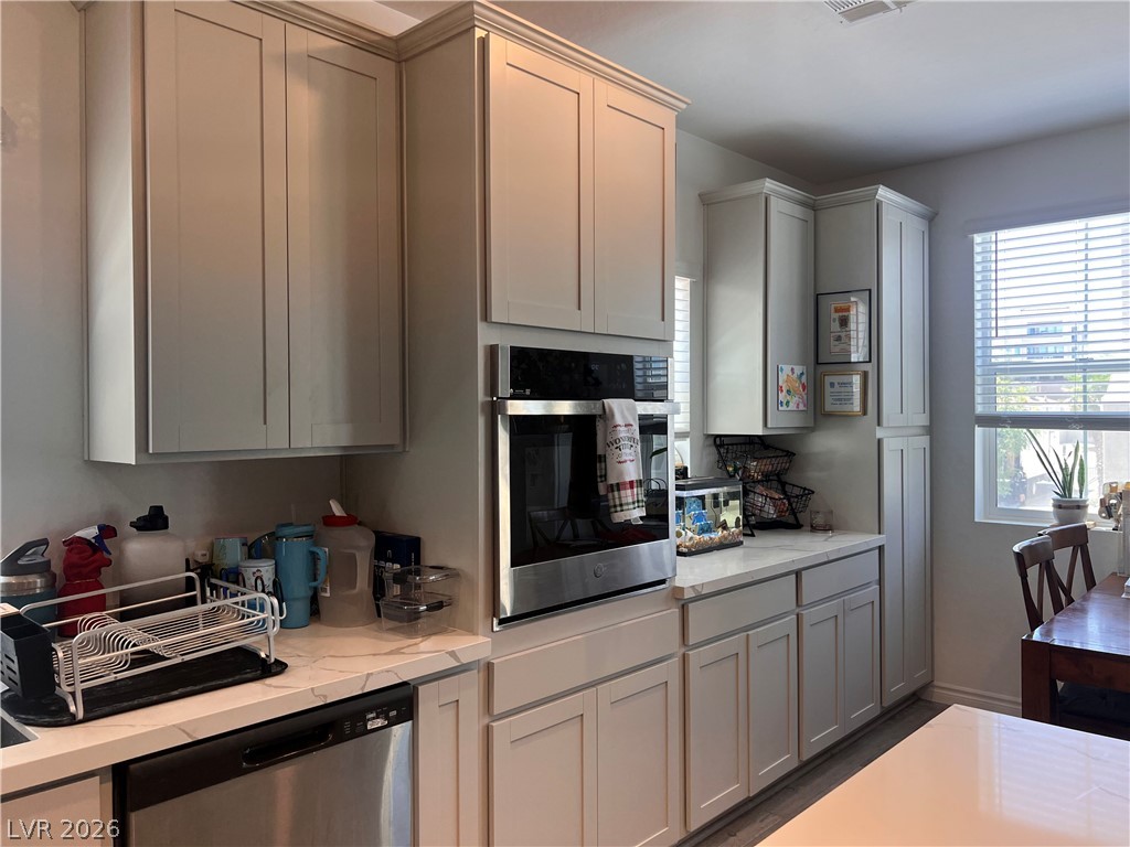 2555 Hampton Road, Unit 2207 Henderson, NV 89052 - Photo 21 of 34 Well-appointed kitchen showcases a built-in oven and ample cabinetry for culinary pursuits.