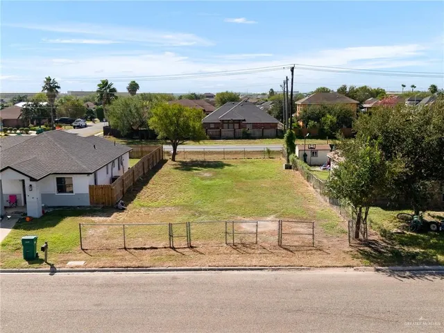 a view of a swimming pool with a lounge chairs