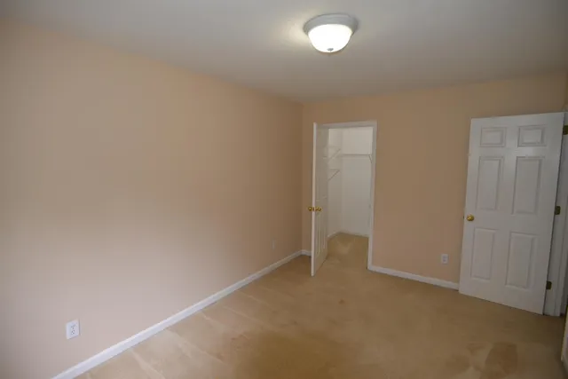 a bathroom with a shower and a tub