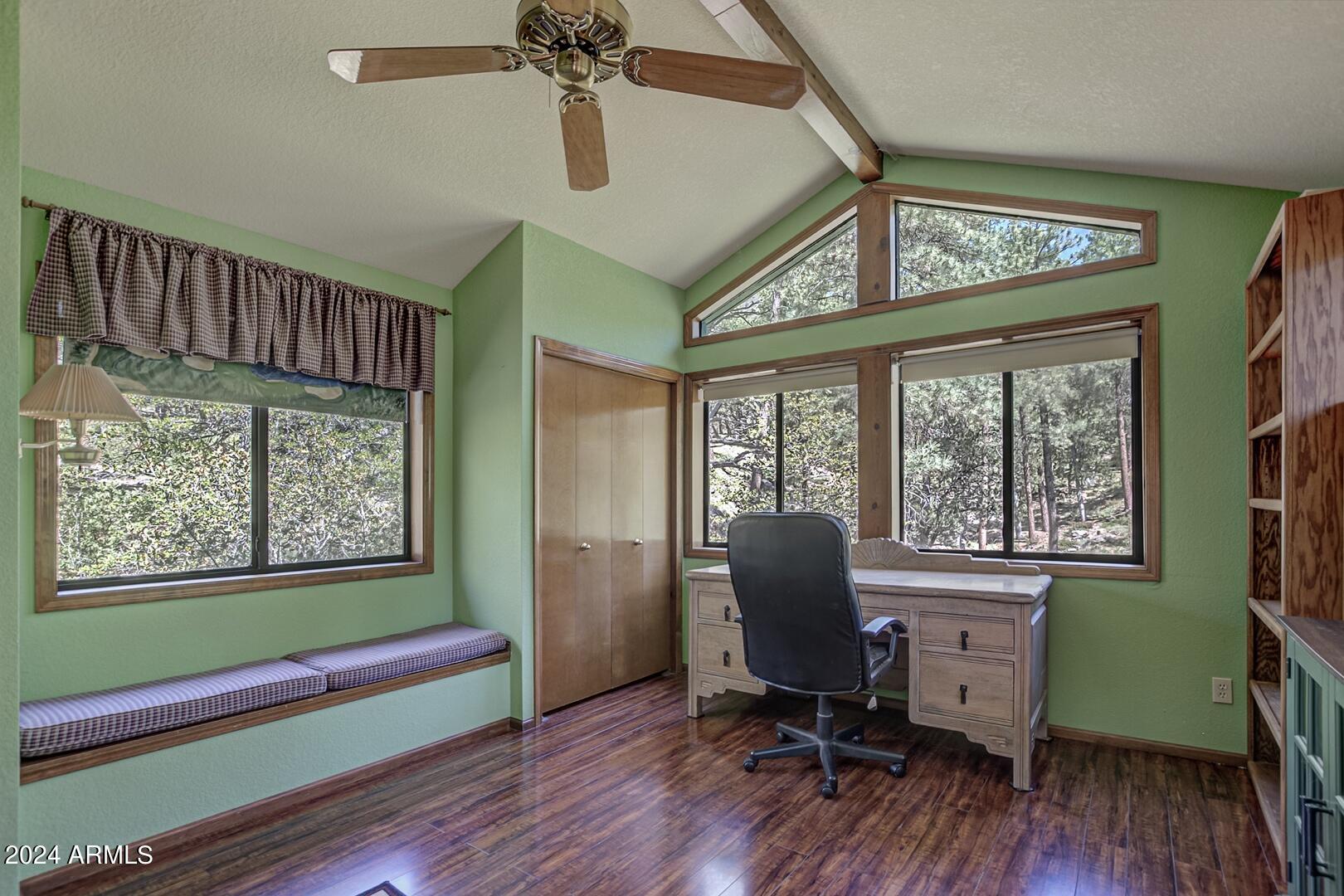 6010 Arroyo Way Pine, AZ 85544 - Photo 20 of 52 a view of a workspace with furniture and a window
