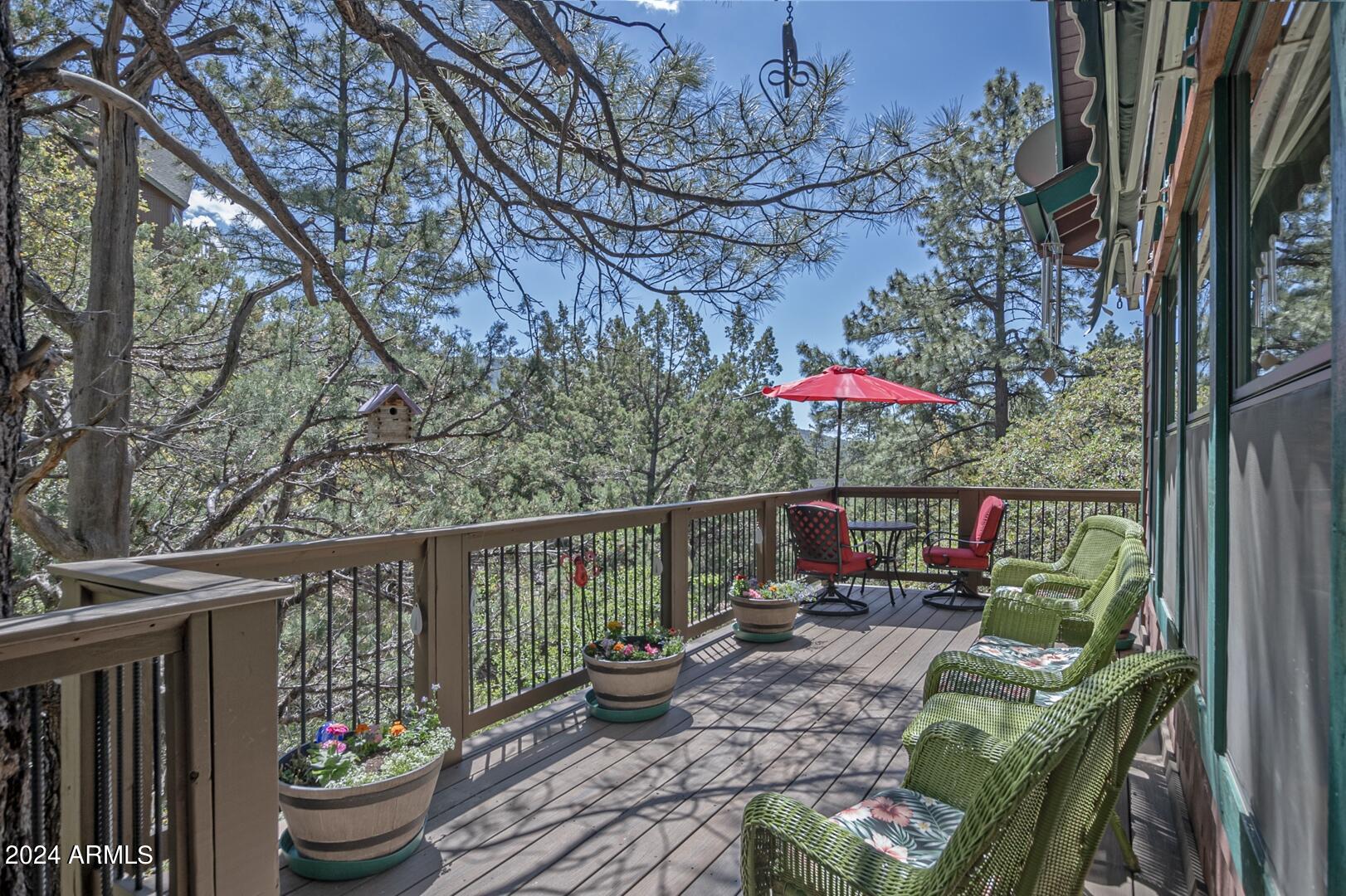 6010 Arroyo Way Pine, AZ 85544 - Photo 2 of 52 a outdoor space with furniture and potted plants