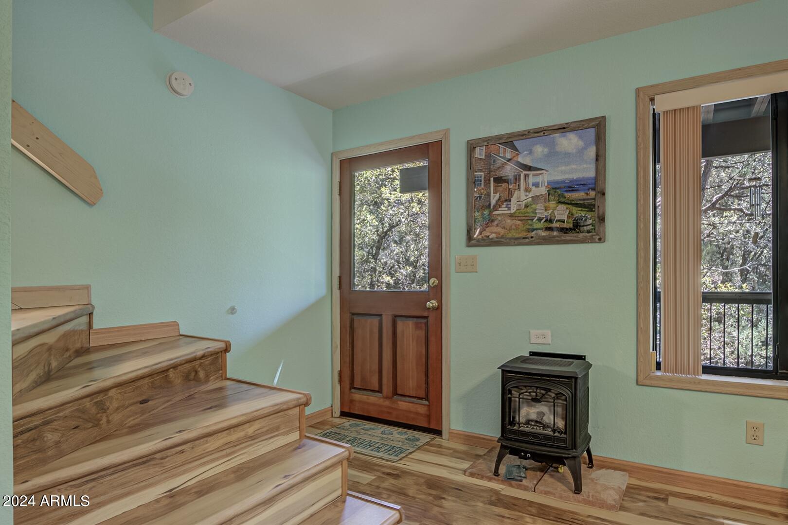 6010 Arroyo Way Pine, AZ 85544 - Photo 26 of 52 a bedroom with a bed and a window