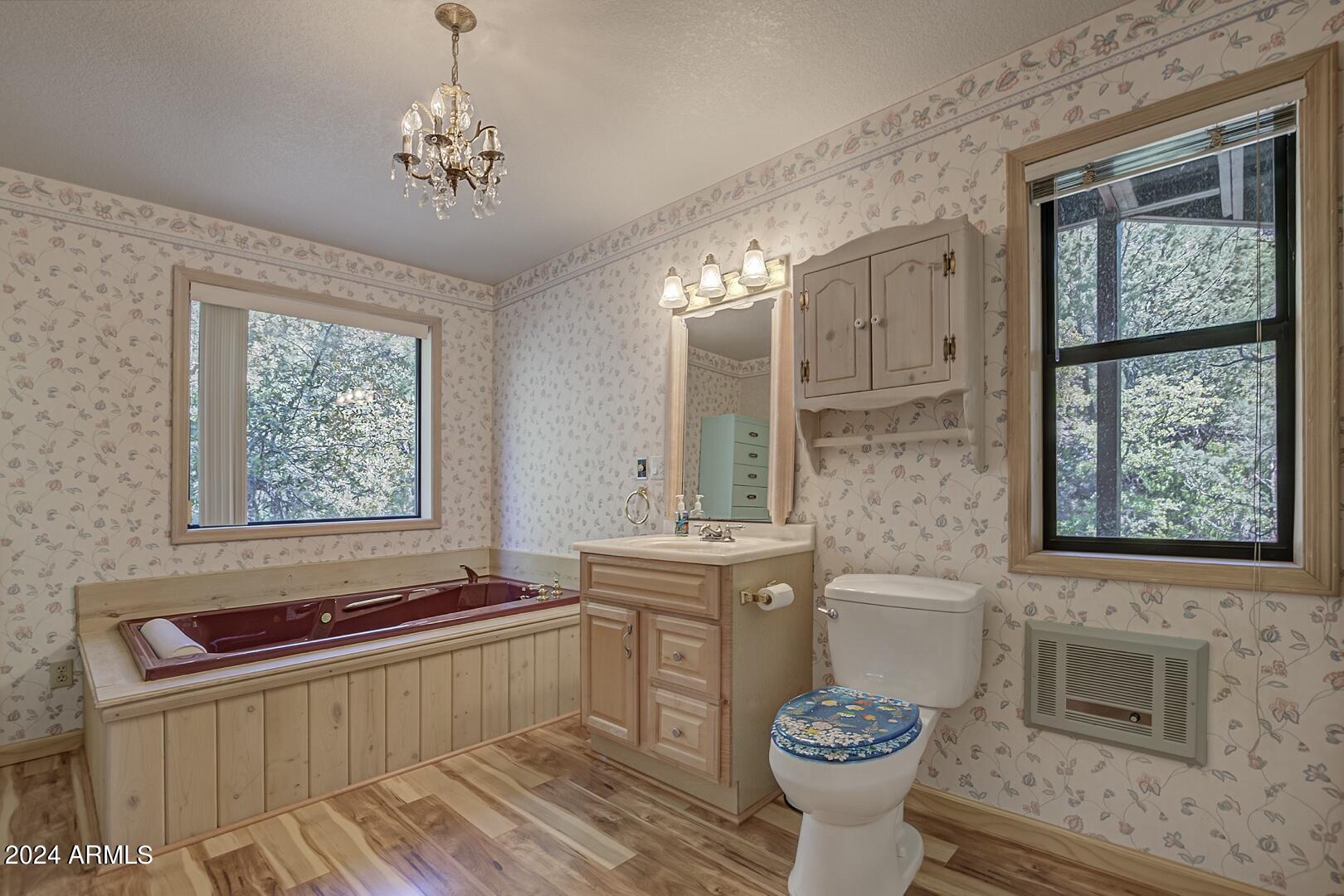 6010 Arroyo Way Pine, AZ 85544 - Photo 30 of 52 a bathroom with a sink a toilet and shower