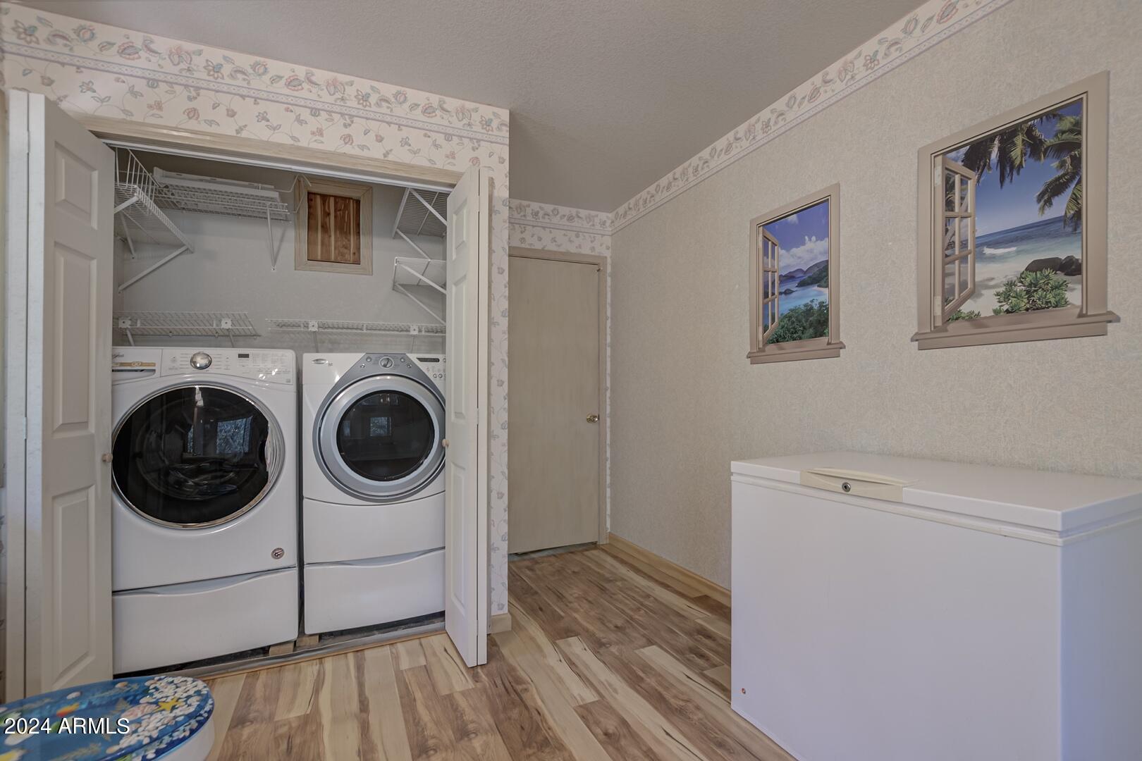 6010 Arroyo Way Pine, AZ 85544 - Photo 32 of 52 a utility room with dryer and washer