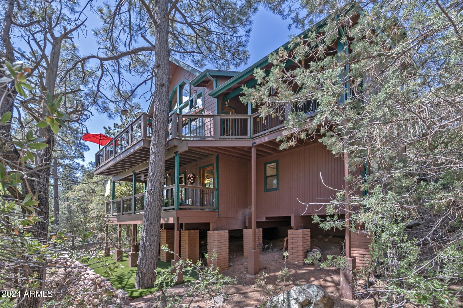 6010 Arroyo Way Pine, AZ 85544 - Photo 38 of 52 a house view with a outdoor space