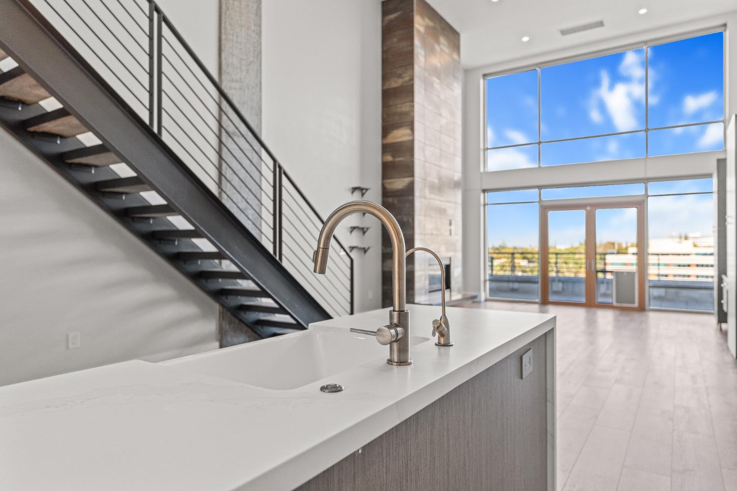 a bathroom with a double vanity sink and a large mirror