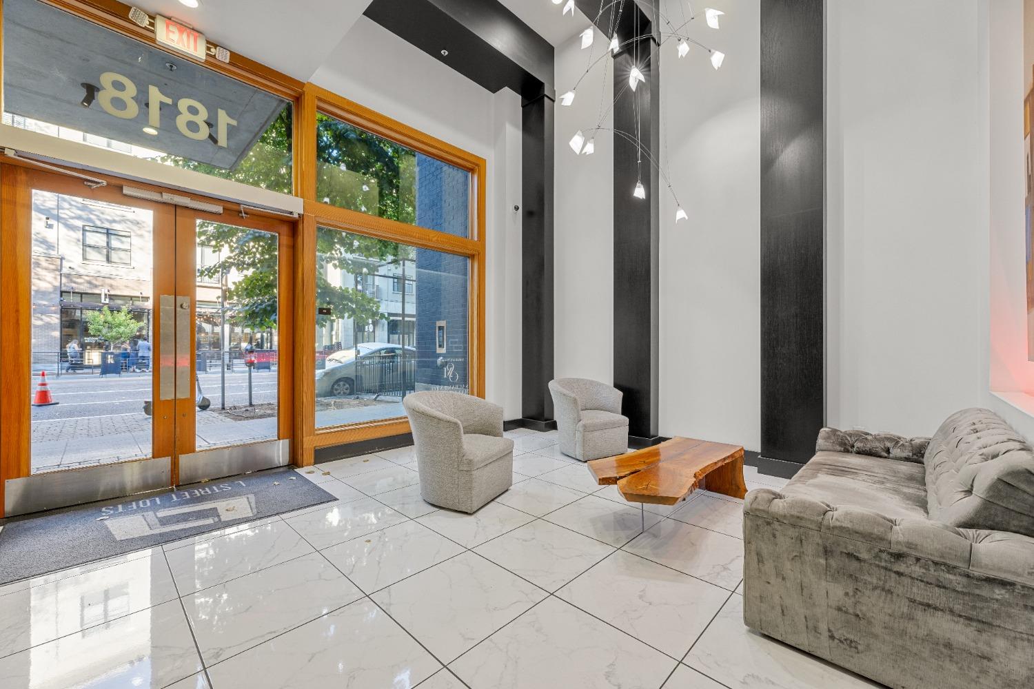 1818 L Street, Unit 807 Sacramento, CA 95811 - Photo 39 of 39 a living room with furniture and large windows