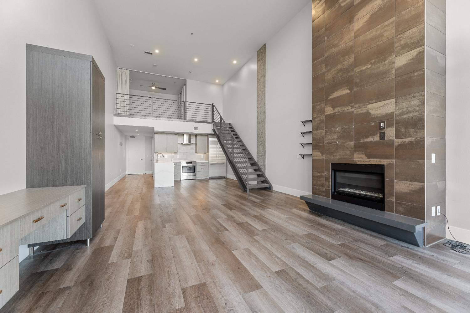 1818 L Street, Unit 807 Sacramento, CA 95811 - Photo 5 of 39 a view of entryway with wooden floor