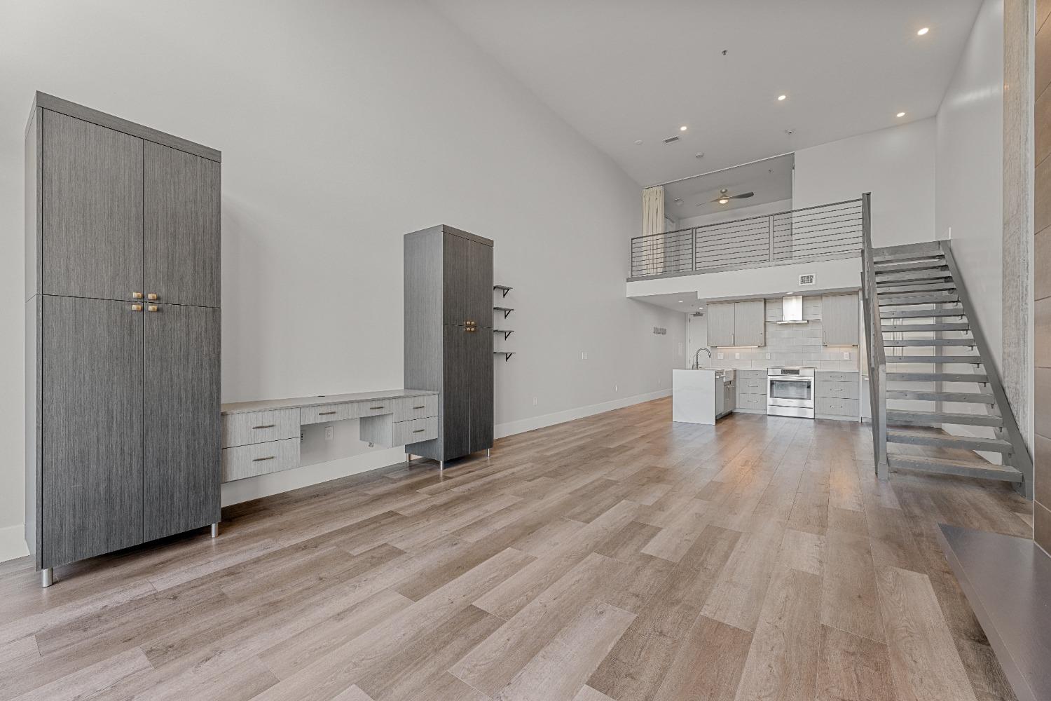 1818 L Street, Unit 807 Sacramento, CA 95811 - Photo 7 of 39 a view of empty room with wooden floor