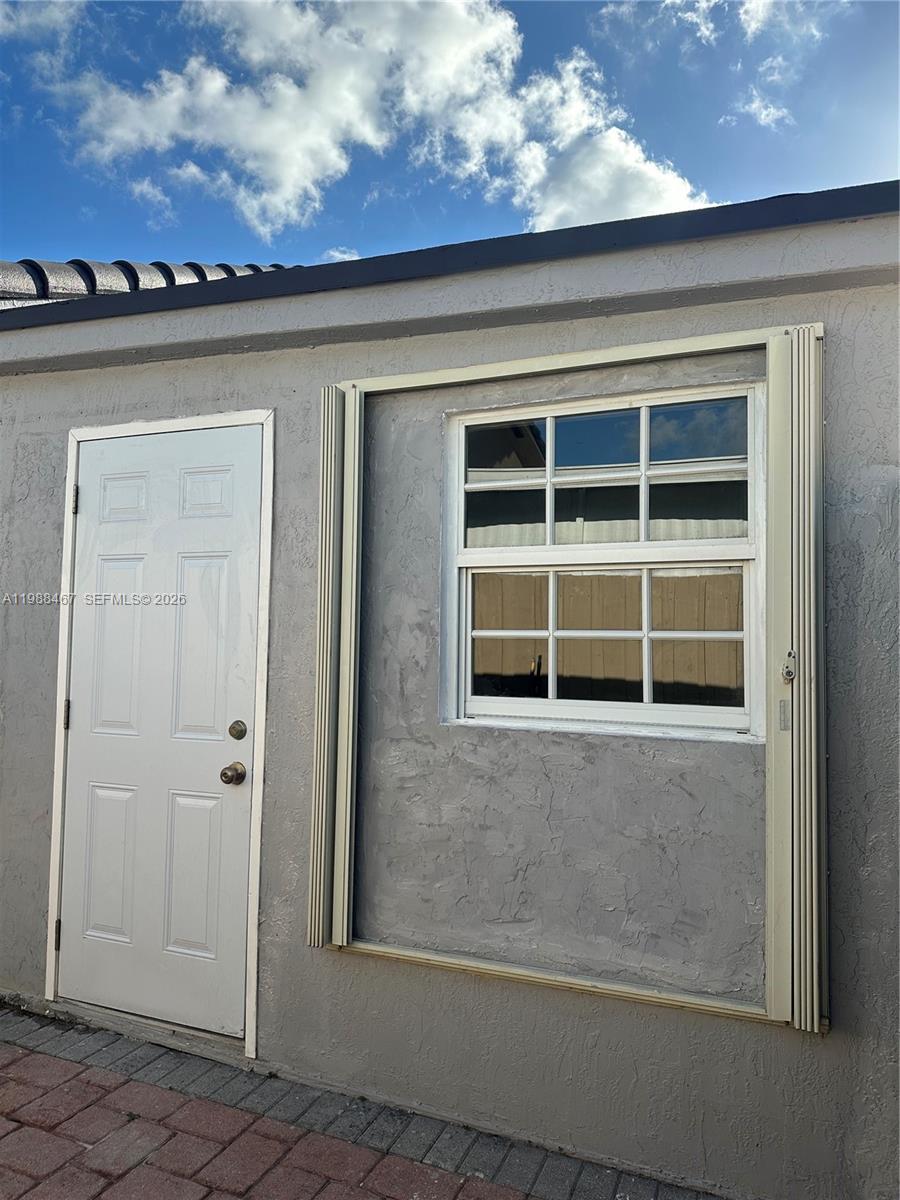 2753 West 68th Place, Unit 1 Hialeah, FL 33016 - Photo 4 of 13 a view of front door