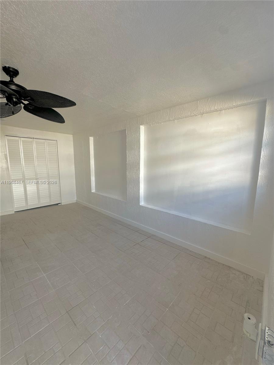 2753 West 68th Place, Unit 1 Hialeah, FL 33016 - Photo 6 of 13 a view of an empty room