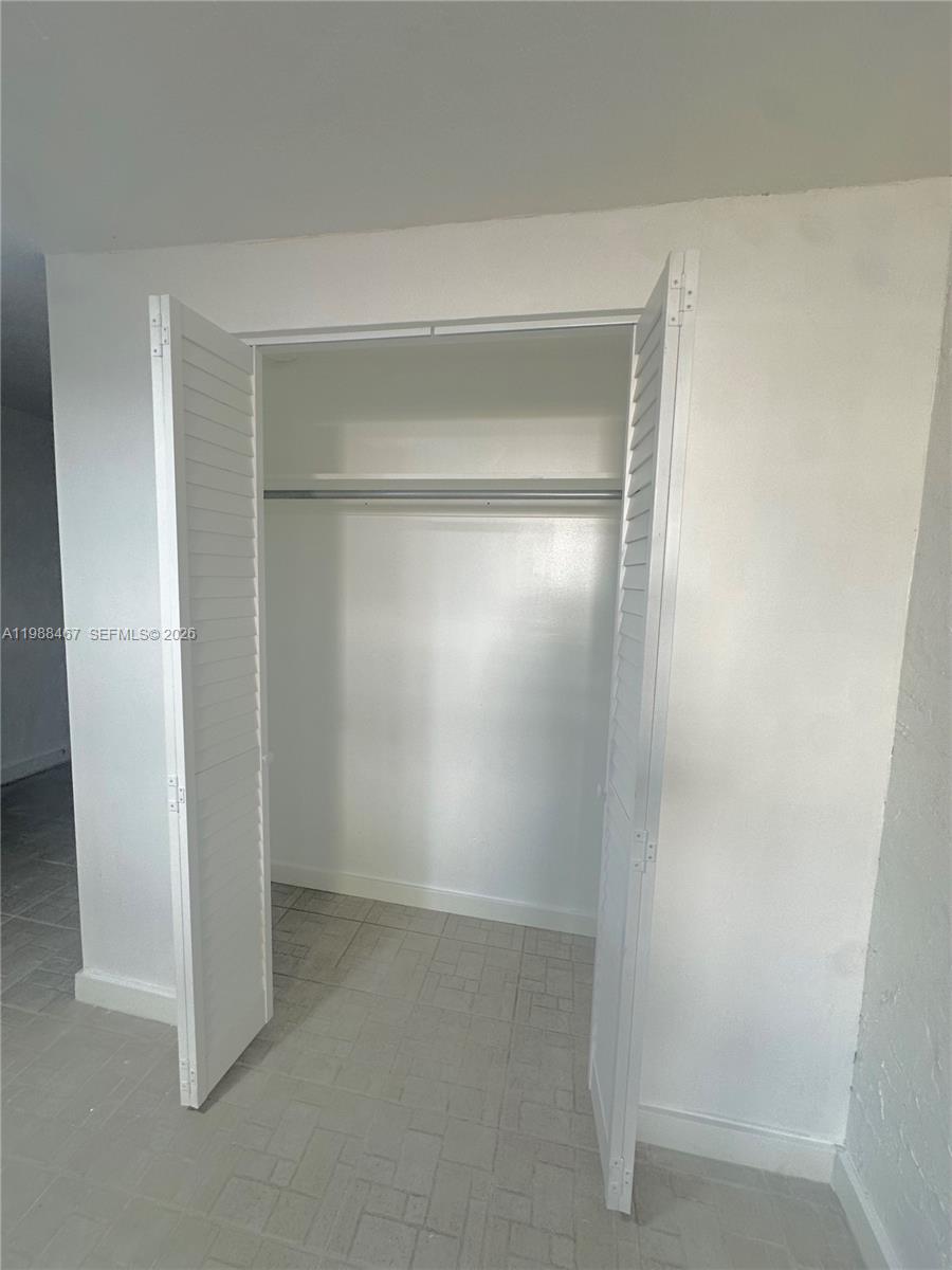 2753 West 68th Place, Unit 1 Hialeah, FL 33016 - Photo 10 of 13 a view of an empty room
