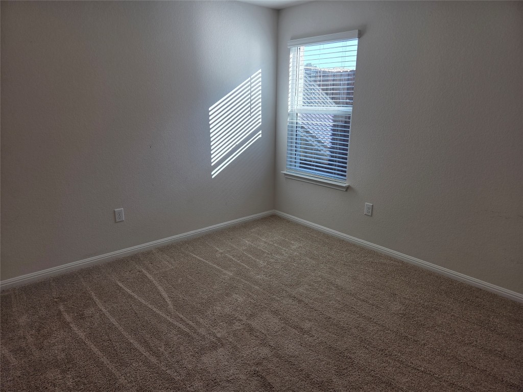 2421 Corriente Path Leander, TX 78641 - Photo 12 of 19 an empty room with windows