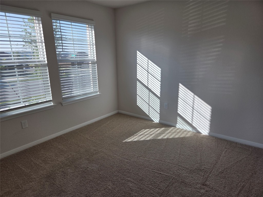 2421 Corriente Path Leander, TX 78641 - Photo 15 of 19 a view of an empty room with a window