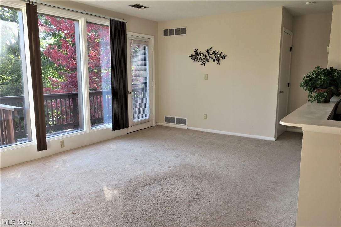 985 Canyon View Road, Unit 201A Northfield, OH 44067 - Photo 8 of 35 Living Rm opens to Balcony & Great Views