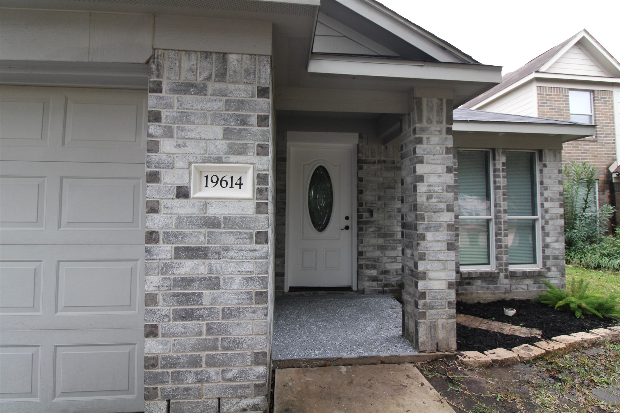 19614 Oleander Ridge Way Cypress, TX 77433 - Photo 3 of 13 a front view of a house with entryway