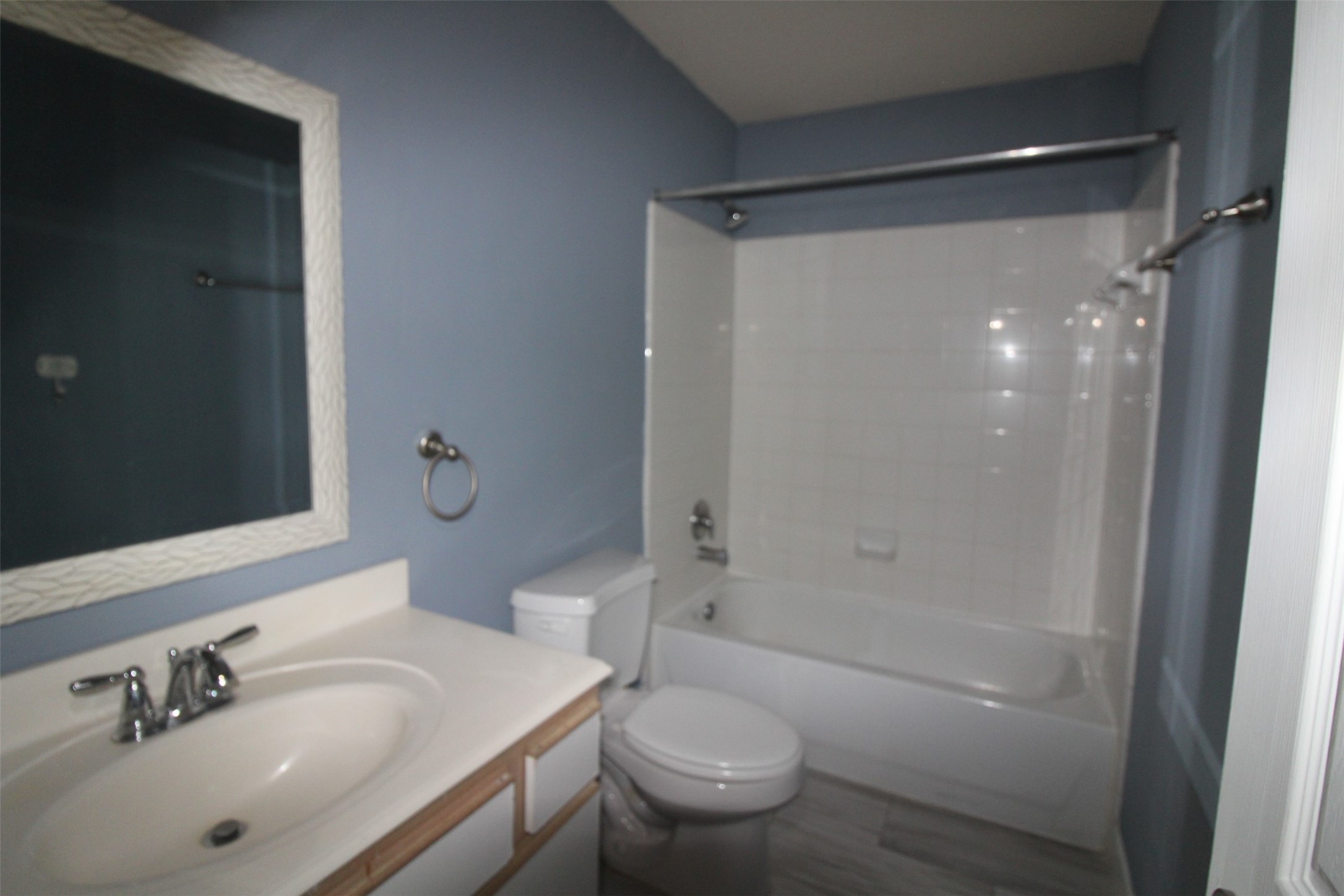 19614 Oleander Ridge Way Cypress, TX 77433 - Photo 10 of 13 a bathroom with a sink toilet and shower