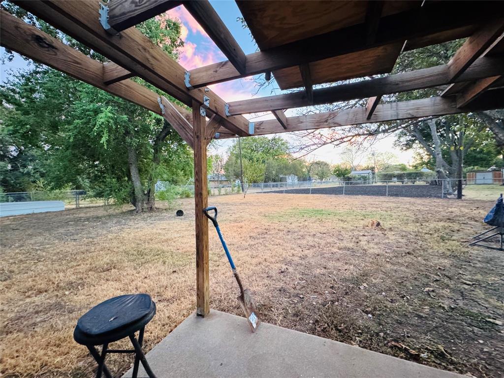 721 Mackey Ranch Road Bruceville-Eddy, TX 76524 - Photo 25 of 33 Concrete patio with a wood pergola