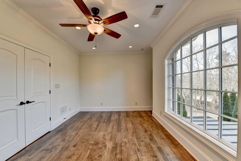 4045 Ridge Road Buford, GA 30519 - Photo 61 of 97 wooden floor in an empty room with a window