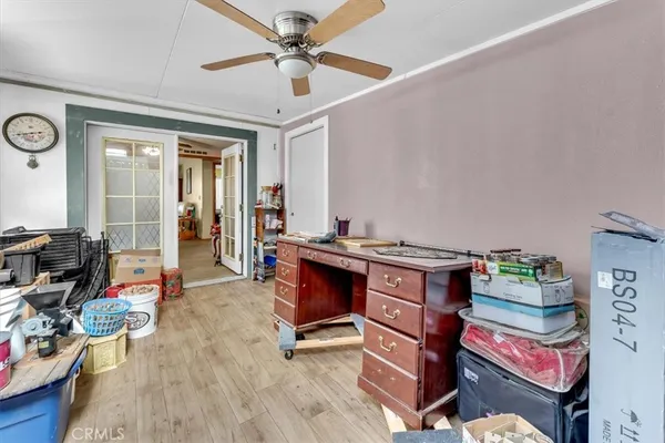 a view of field with grass and trees