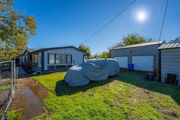 a backyard of a house with lots of green space