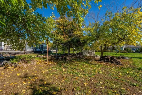 a view of a park with swings and slides