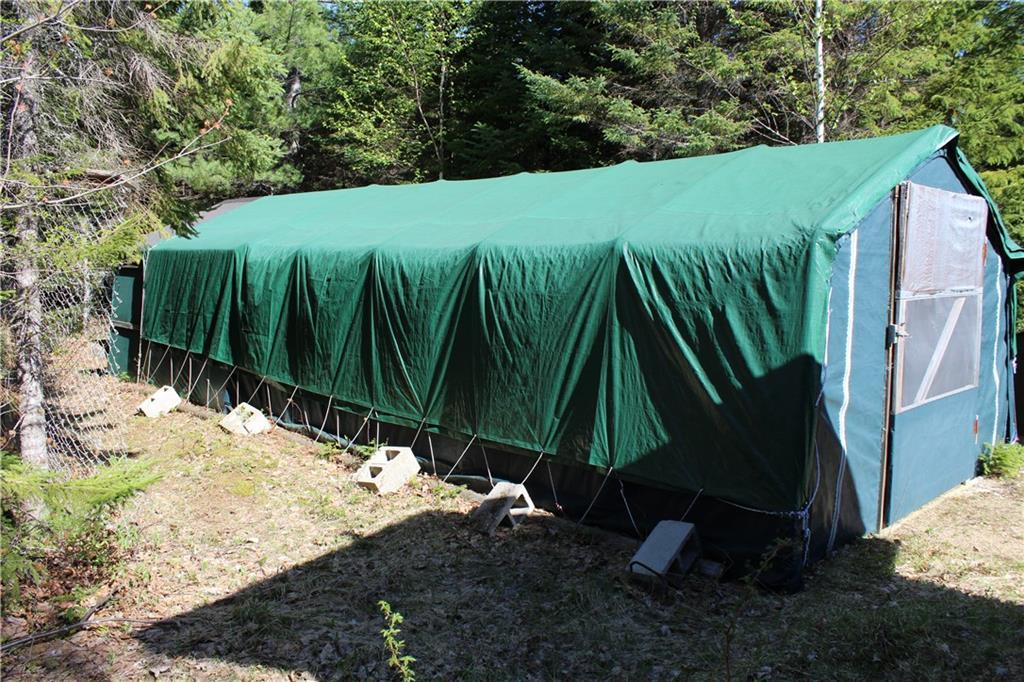 62 Ledge View Road West Forks, ME 04985 - Photo 32 of 33 Wood shed and toy storage with drive...