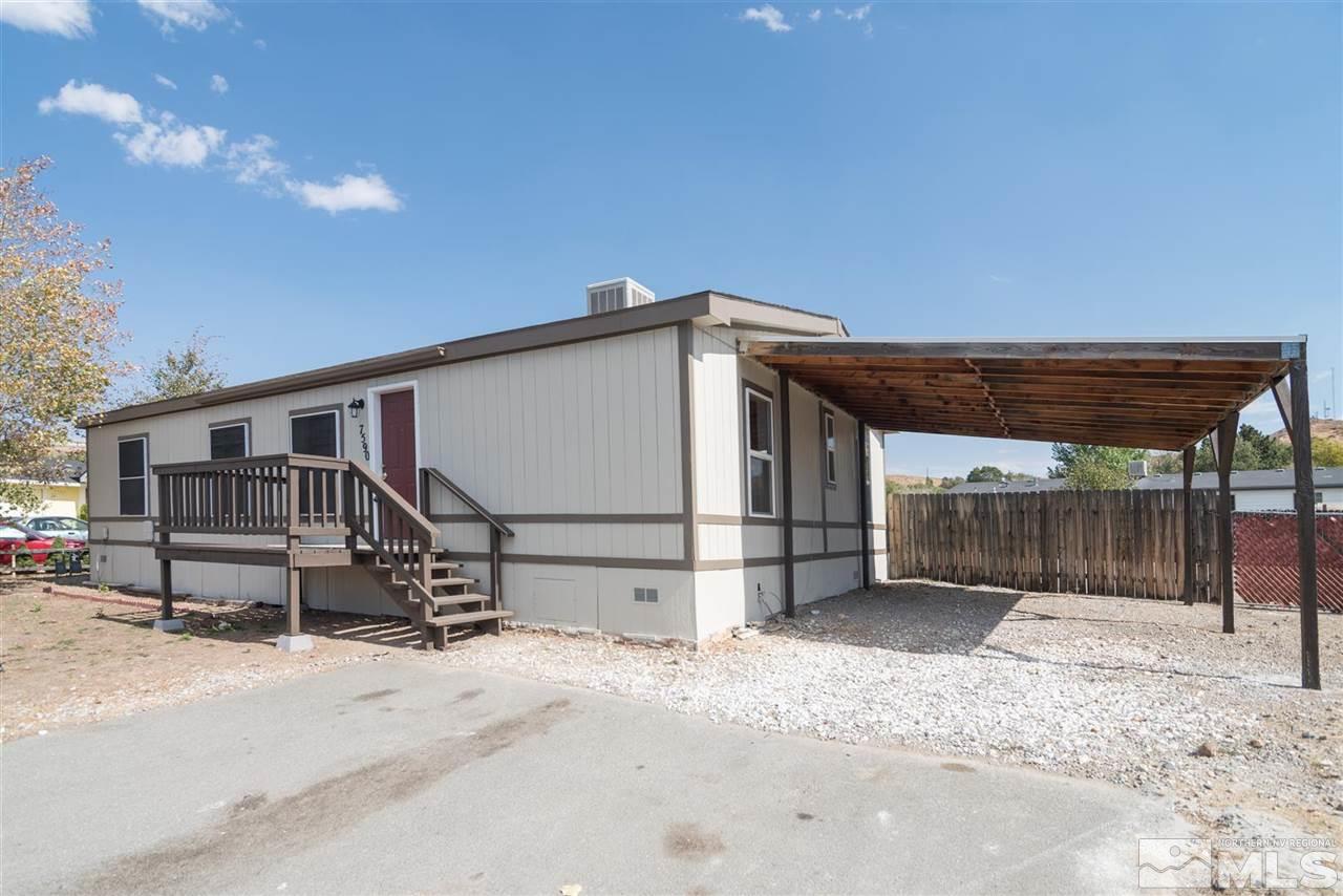 7590 Lytton Road Reno, NV 89506 - Photo 1 of 1 a view of a house with wooden fence