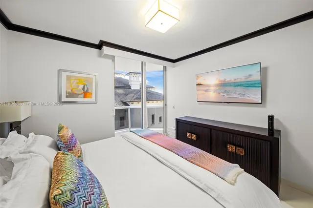 a bathroom with a sink toilet vanity and shower