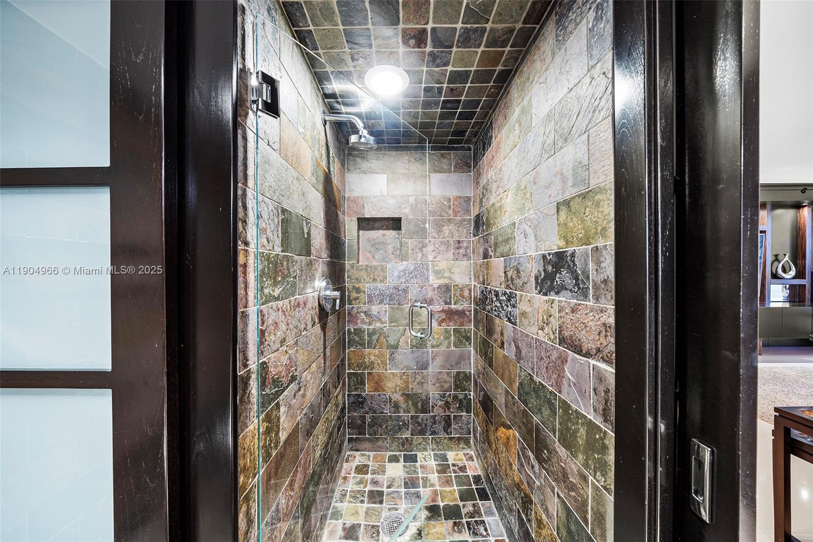 4775 Collins Avenue, Unit 501 Miami Beach, FL 33140 - Photo 32 of 60 a view of entryway with brick walls