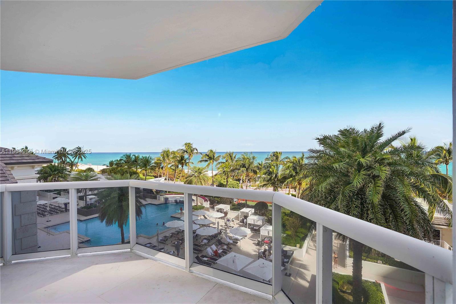 4775 Collins Avenue, Unit 501 Miami Beach, FL 33140 - Photo 33 of 60 a view of a balcony with an outdoor space