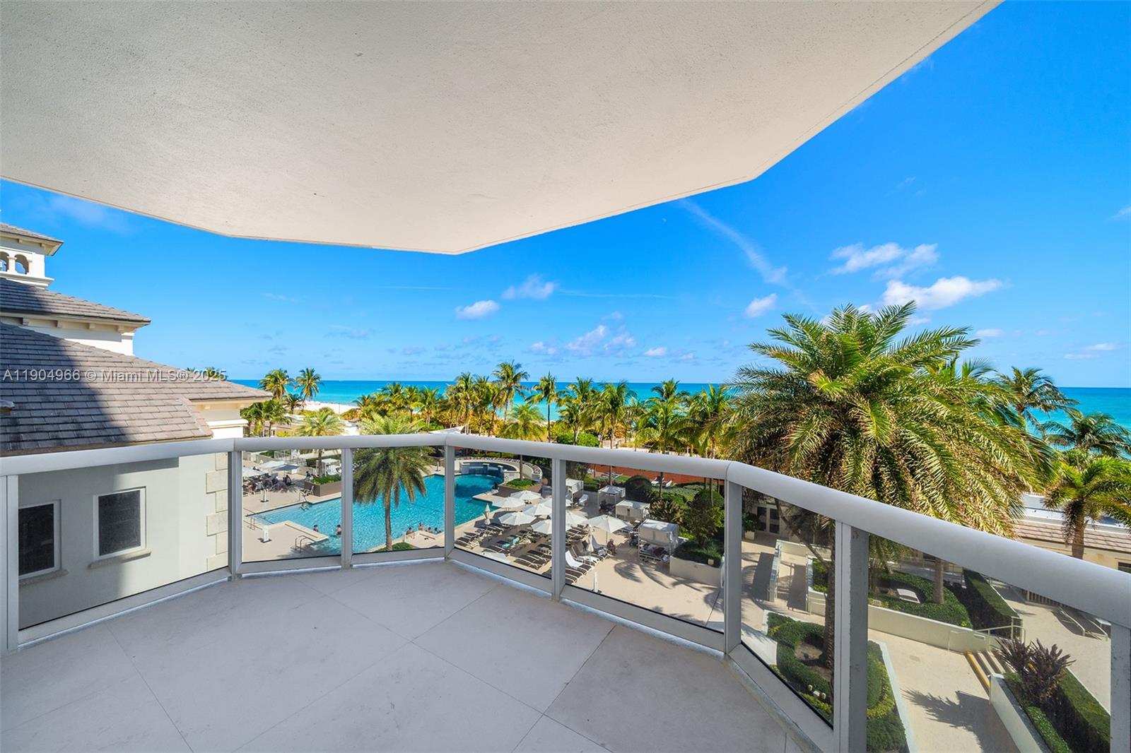 4775 Collins Avenue, Unit 501 Miami Beach, FL 33140 - Photo 36 of 60 a view of a balcony with chairs