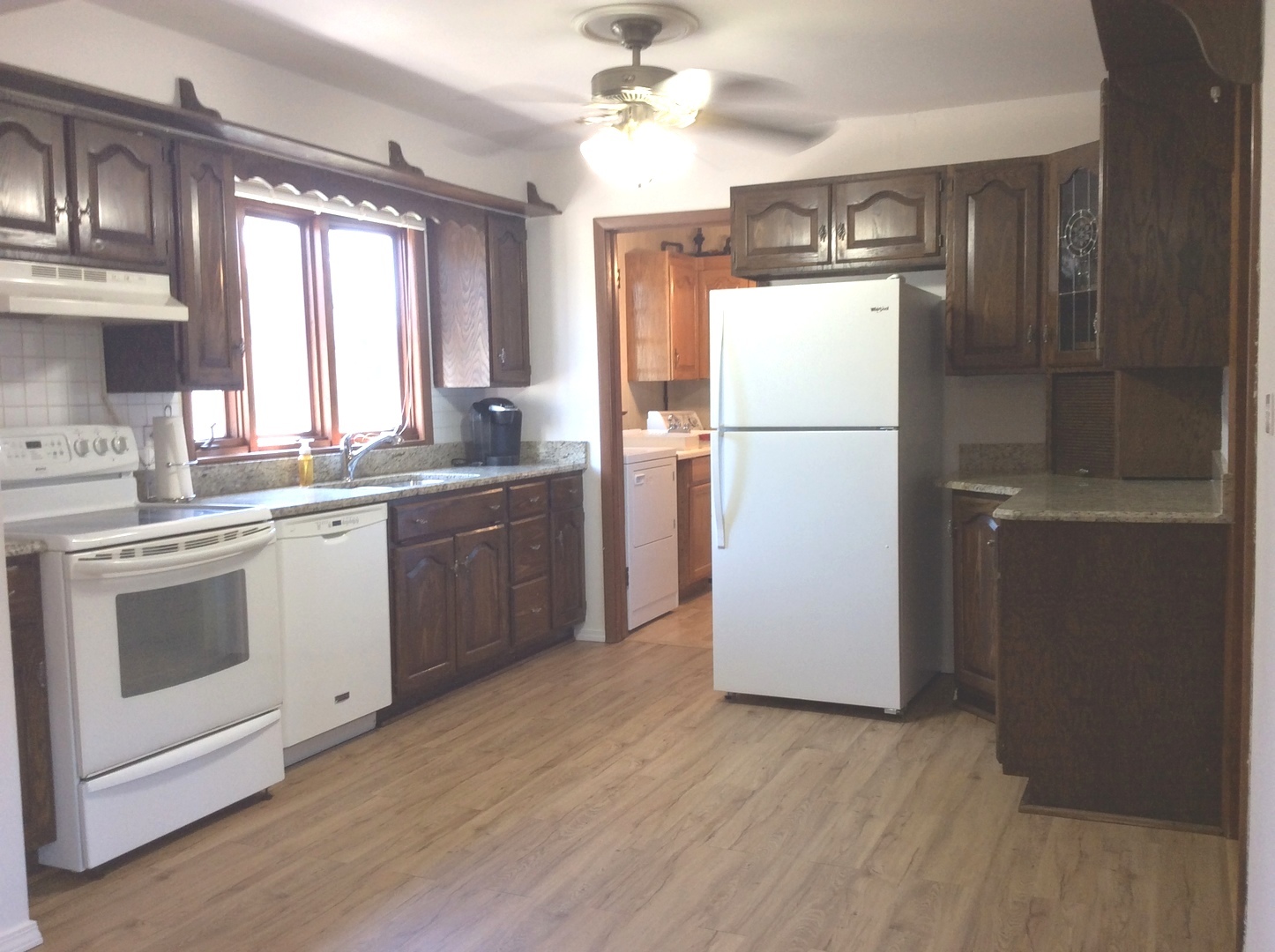 5909 107th Street Chicago Ridge, IL 60415 - Photo 15 of 32 a kitchen with a refrigerator sink and cabinets