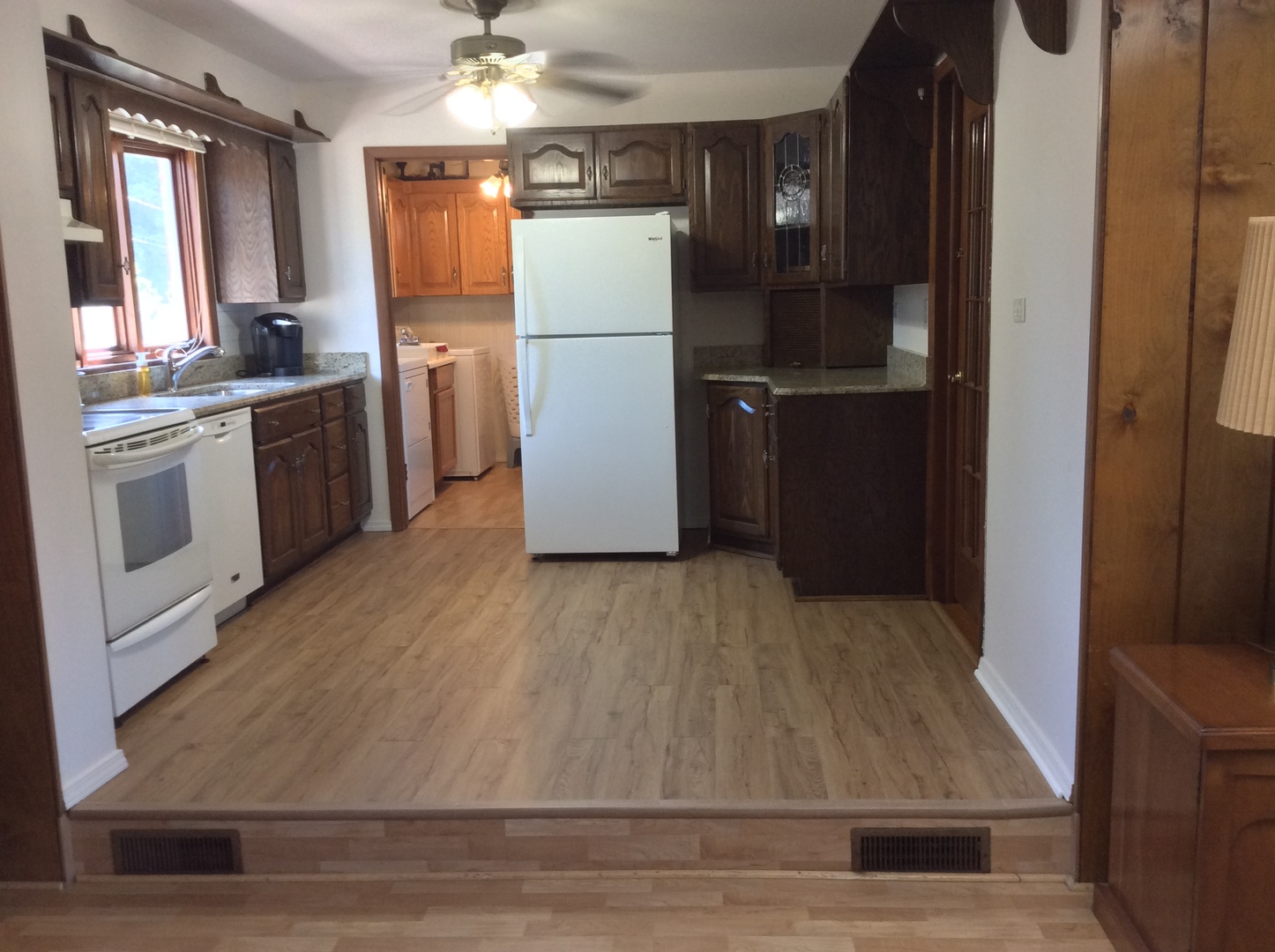 5909 107th Street Chicago Ridge, IL 60415 - Photo 16 of 32 a kitchen with a refrigerator and a stove top oven