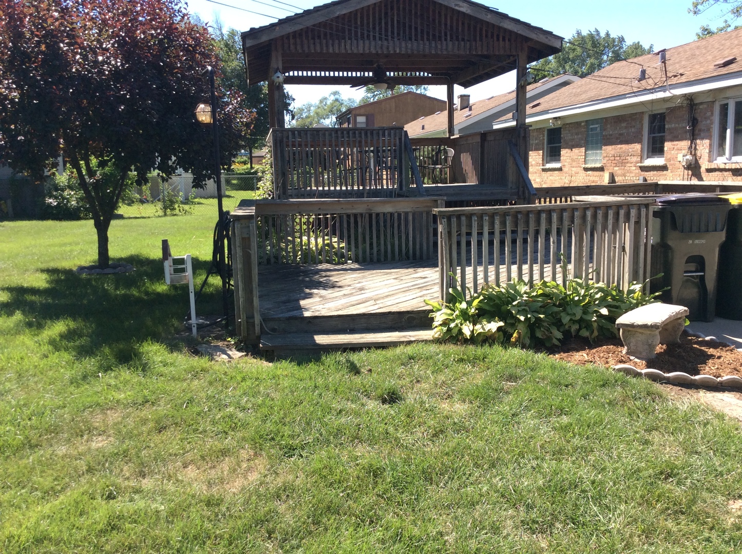 5909 107th Street Chicago Ridge, IL 60415 - Photo 29 of 32 a view of a chair and table in the garden