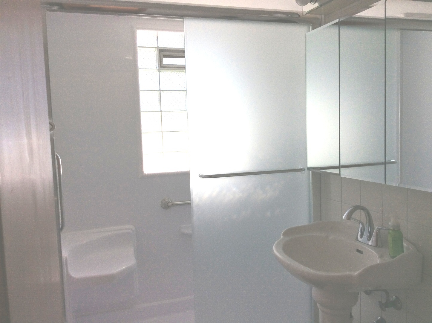 5909 107th Street Chicago Ridge, IL 60415 - Photo 6 of 32 a bathroom with a sink and a mirror