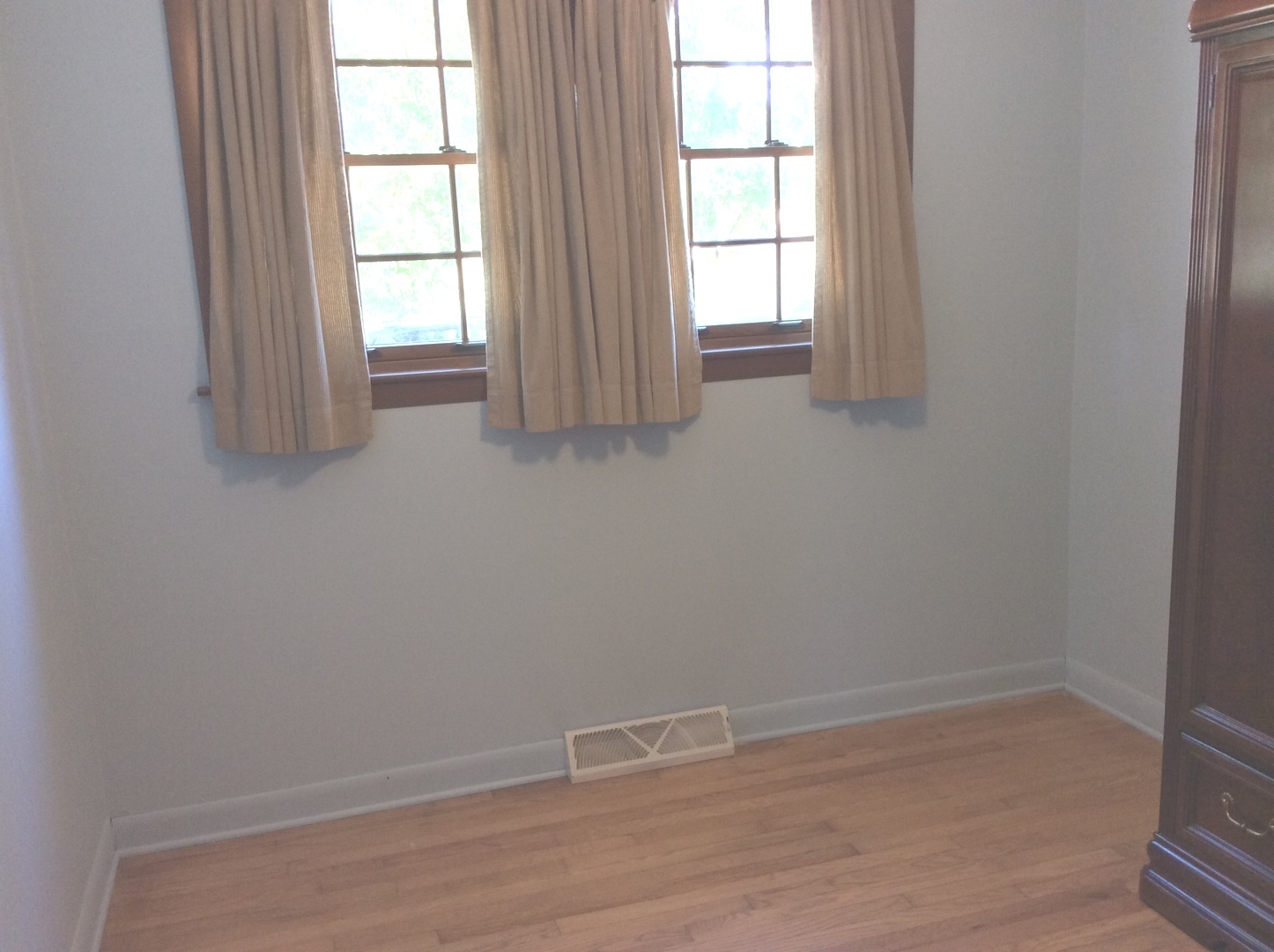 5909 107th Street Chicago Ridge, IL 60415 - Photo 8 of 32 an empty room with wooden floor and windows