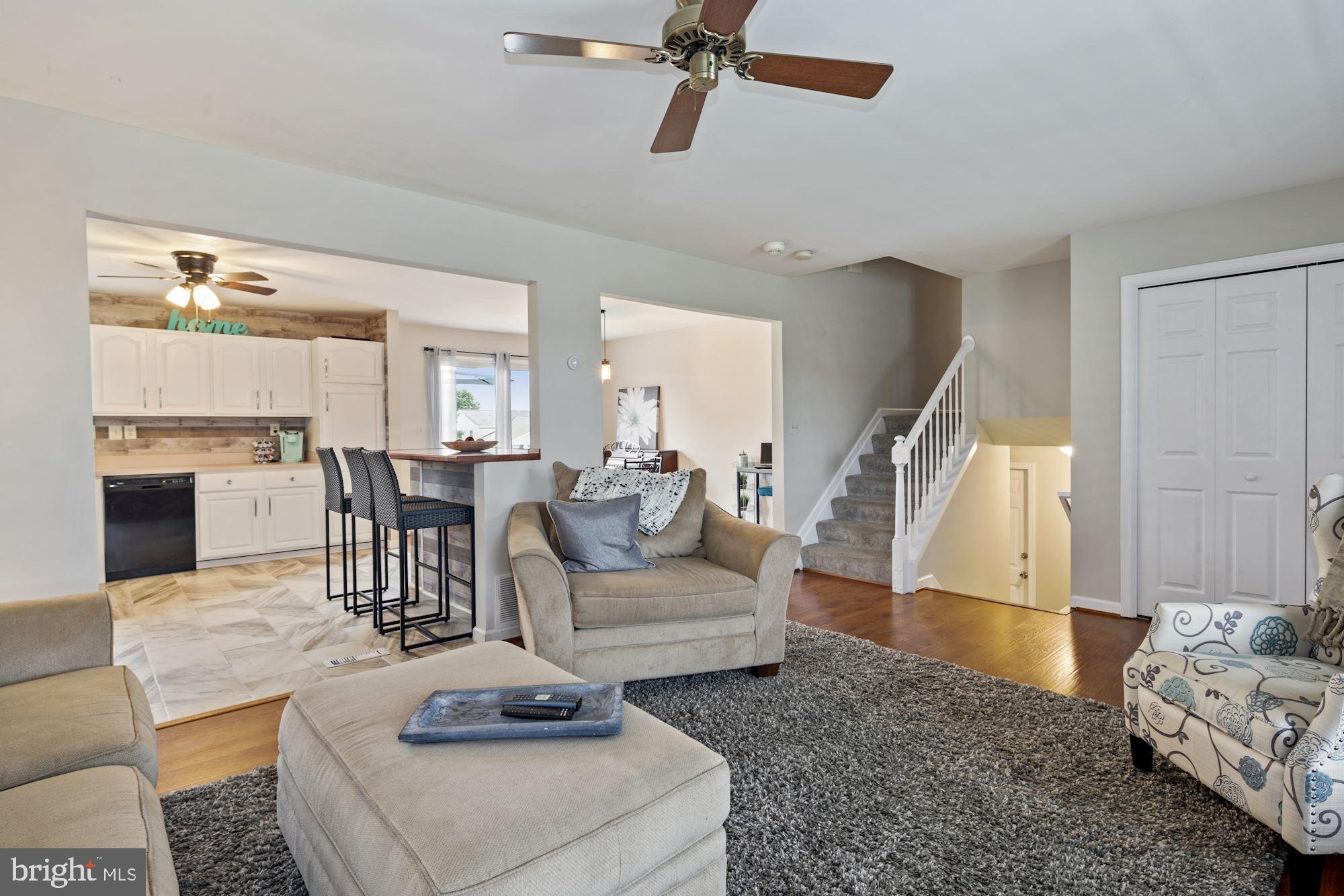 844 Snowfall Way Westminster, MD 21157 - Photo 4 of 28 Living room opens to kitchen and large island