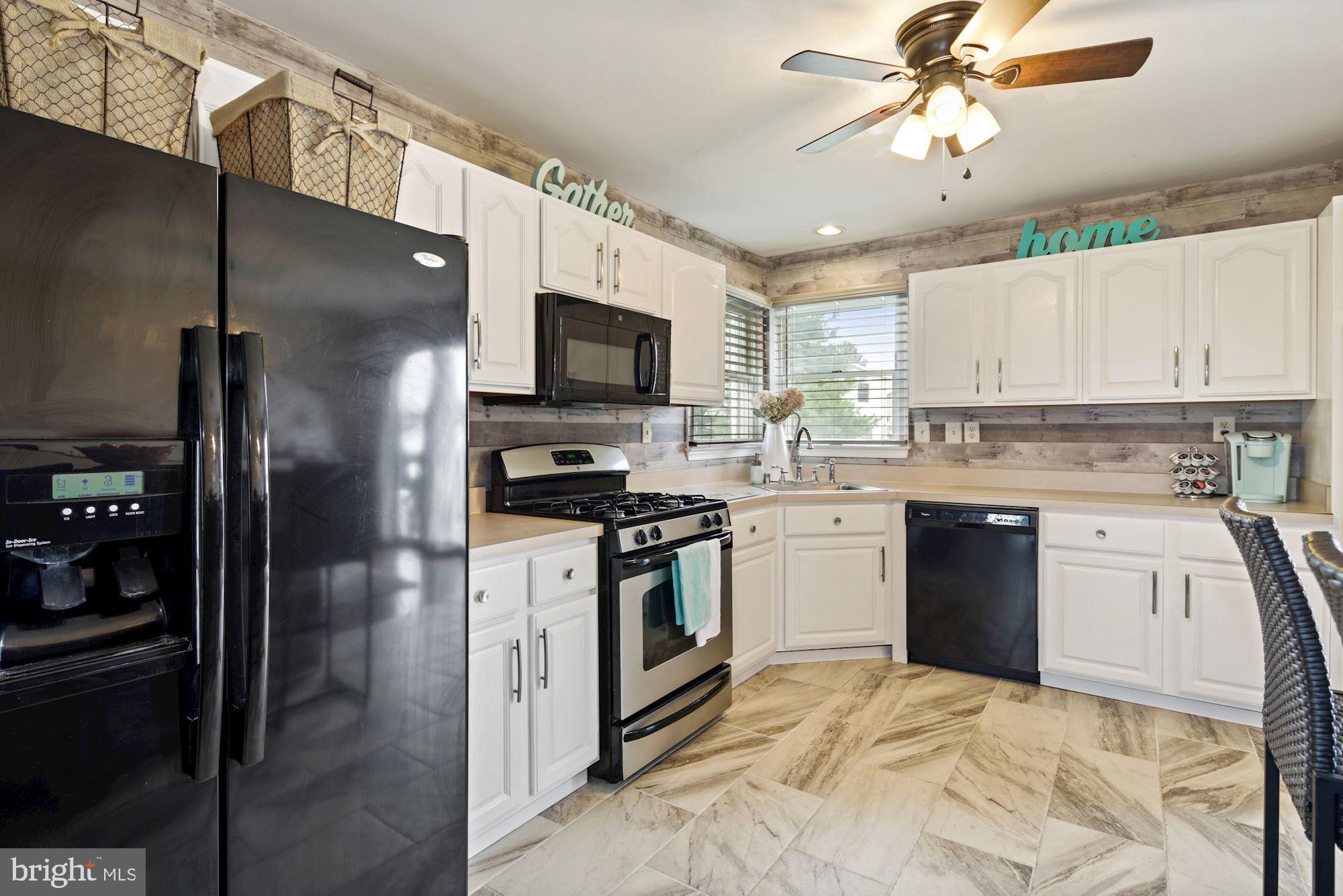 844 Snowfall Way Westminster, MD 21157 - Photo 7 of 28 Bright kitchen with fan