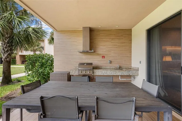 a view of a terrace with sitting area