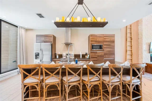 a patio with table and chairs